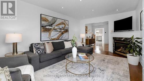 1151 Charlton Way, Milton (Dempsey), ON - Indoor Photo Showing Living Room With Fireplace