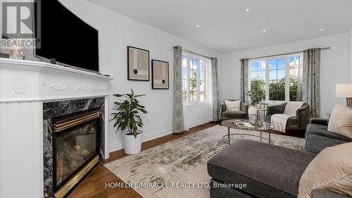 1151 Charlton Way, Milton (Dempsey), ON - Indoor Photo Showing Living Room With Fireplace