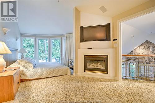 214 Crystal Bay Drive, Amherstburg, ON - Indoor Photo Showing Bedroom With Fireplace