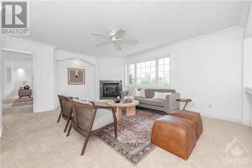 6804 Lakes Park Drive, Ottawa, ON - Indoor Photo Showing Living Room With Fireplace