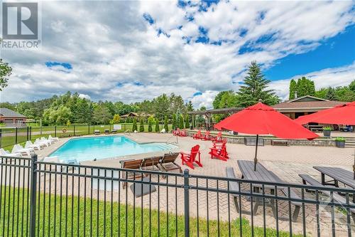 6804 Lakes Park Drive, Ottawa, ON - Outdoor With In Ground Pool