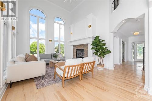 6804 Lakes Park Drive, Ottawa, ON - Indoor Photo Showing Living Room With Fireplace