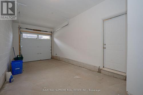 1556 Hilson Heights, Milton (Cobban), ON - Indoor Photo Showing Garage