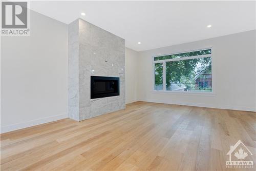 14 Thornton Avenue, Ottawa, ON - Indoor Photo Showing Living Room With Fireplace