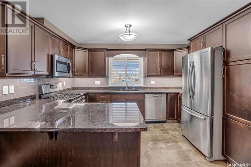 106 3750 Haughton Road E, Regina, SK - Indoor Photo Showing Kitchen With Stainless Steel Kitchen With Upgraded Kitchen