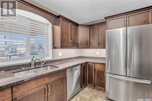 106 3750 Haughton Road E, Regina, SK - Indoor Photo Showing Kitchen With Stainless Steel Kitchen With Double Sink