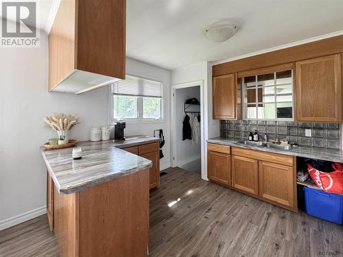 199 Montgomery Ave, Temiskaming Shores, ON - Indoor Photo Showing Kitchen With Double Sink