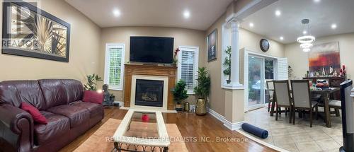 933 Knotty Pine (Main &Up) Grove, Mississauga (Meadowvale Village), ON - Indoor Photo Showing Living Room With Fireplace