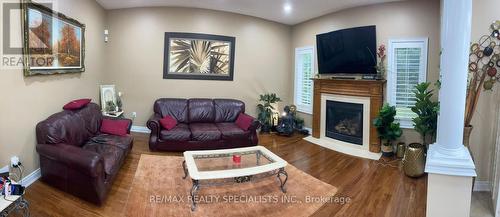 933 Knotty Pine (Main &Up) Grove, Mississauga (Meadowvale Village), ON - Indoor Photo Showing Living Room With Fireplace