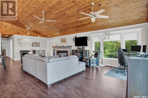 11 Meadowlark Drive, Glen Harbour, SK - Indoor Photo Showing Living Room With Fireplace