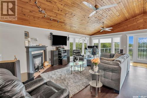 11 Meadowlark Drive, Glen Harbour, SK - Indoor Photo Showing Living Room With Fireplace