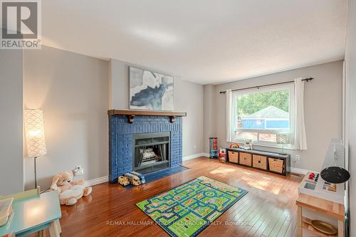 199 Hanmer Street W, Barrie (West Bayfield), ON - Indoor Photo Showing Living Room With Fireplace