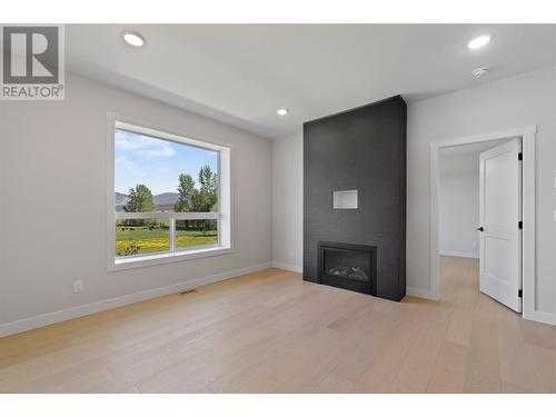 1840 10 Street Sw Unit# 19 Lot# 24, Salmon Arm, BC - Indoor Photo Showing Other Room With Fireplace