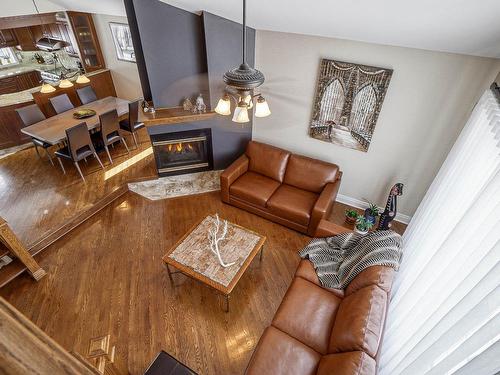 Living room - 922 Rue Delacroix, Repentigny (Repentigny), QC - Indoor Photo Showing Living Room With Fireplace