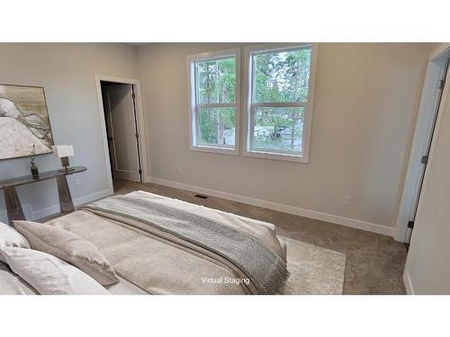 234 Murtle Cres, Clearwater, BC - Indoor Photo Showing Bedroom