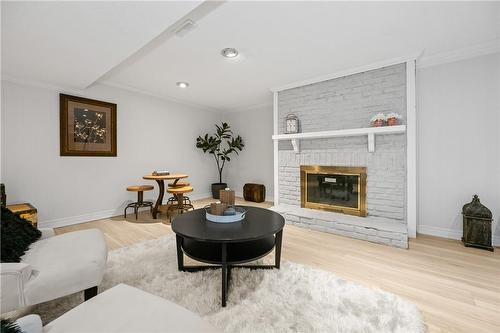 2301 Cavendish Drive|Unit #118, Burlington, ON - Indoor Photo Showing Living Room With Fireplace