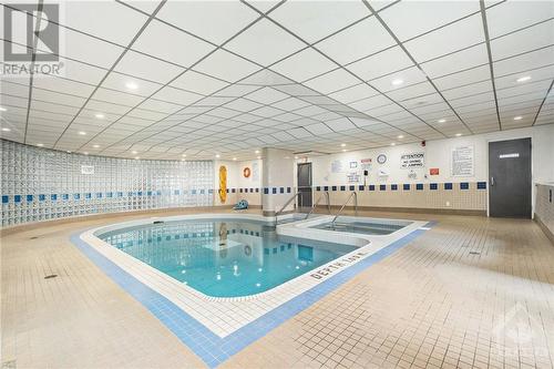 199 Kent Street Unit#Ph2407, Ottawa, ON - Indoor Photo Showing Other Room With In Ground Pool