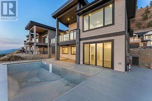 1154 Lone Pine Drive, Kelowna, BC - Outdoor With In Ground Pool