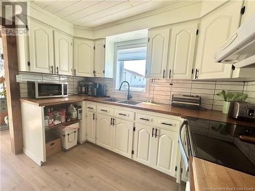 28 Des Chasseurs Street, Le Goulet, NB - Indoor Photo Showing Kitchen With Double Sink