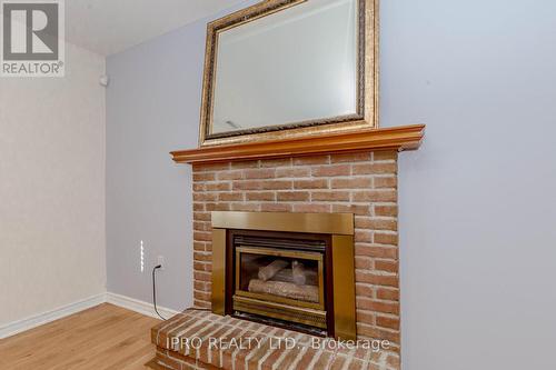 211 Leaside Drive, Welland, ON - Indoor Photo Showing Living Room With Fireplace