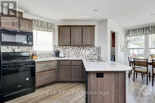 65 - 7481 Mitch Owens Road, Ottawa, ON - Indoor Photo Showing Kitchen With Double Sink