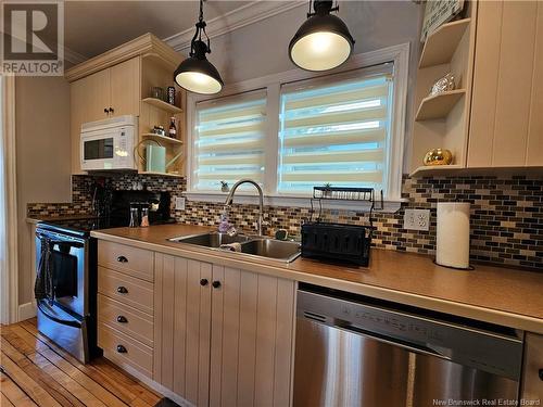 176 Chapel Street, Grand-Sault/Grand Falls, NB - Indoor Photo Showing Kitchen With Double Sink