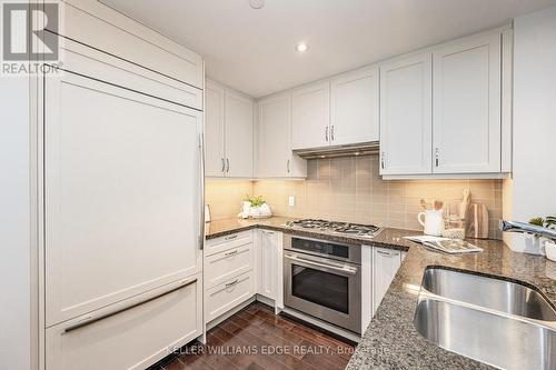 516 - 11 Bronte Road, Oakville (Bronte West), ON - Indoor Photo Showing Kitchen With Double Sink With Upgraded Kitchen