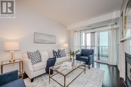 516 - 11 Bronte Road, Oakville (Bronte West), ON - Indoor Photo Showing Living Room With Fireplace