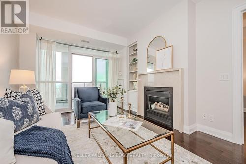 516 - 11 Bronte Road, Oakville, ON - Indoor Photo Showing Living Room With Fireplace