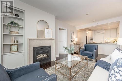 516 - 11 Bronte Road, Oakville, ON - Indoor Photo Showing Living Room With Fireplace