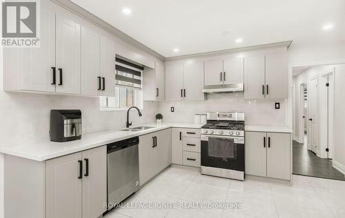 3325 Victory Crescent, Mississauga (Malton), ON - Indoor Photo Showing Kitchen With Double Sink With Upgraded Kitchen