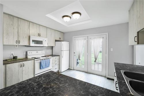 215 Strathearne Avenue, Hamilton, ON - Indoor Photo Showing Kitchen With Double Sink