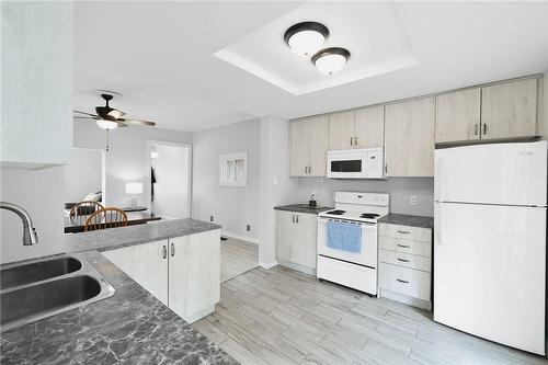 215 Strathearne Avenue, Hamilton, ON - Indoor Photo Showing Kitchen With Double Sink