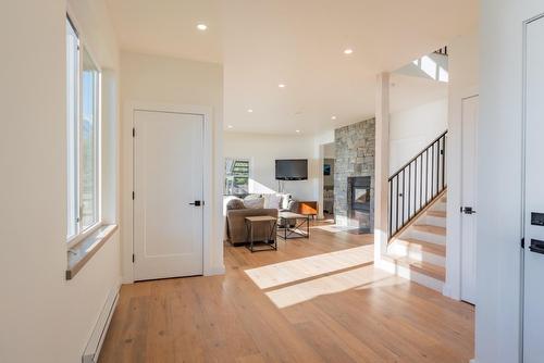 575 Larch Drive, Kaslo, BC - Indoor Photo Showing Other Room With Fireplace