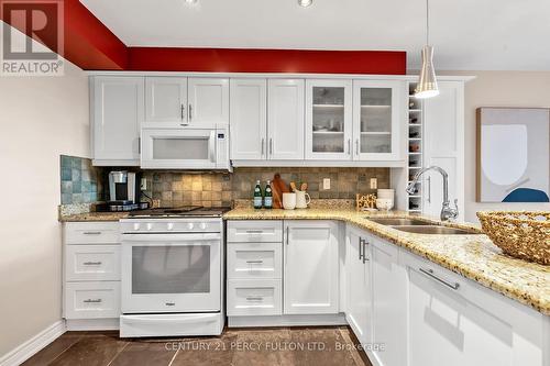 19 Davey Street, Ajax (South East), ON - Indoor Photo Showing Kitchen With Double Sink