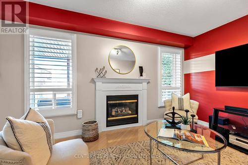 19 Davey Street, Ajax (South East), ON - Indoor Photo Showing Living Room With Fireplace