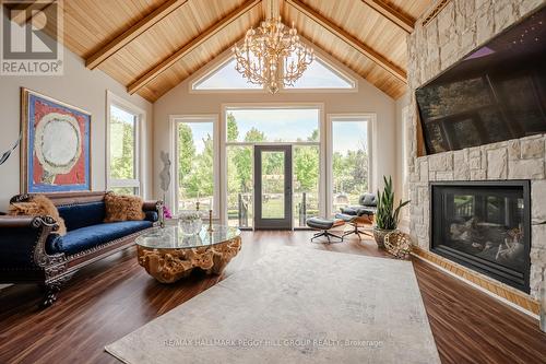 158 Mennill Drive, Springwater (Snow Valley), ON - Indoor Photo Showing Living Room With Fireplace