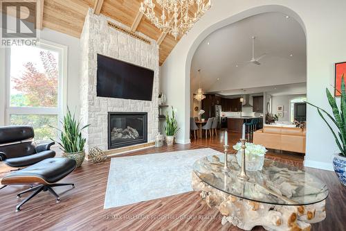 158 Mennill Drive, Springwater (Snow Valley), ON - Indoor Photo Showing Living Room With Fireplace