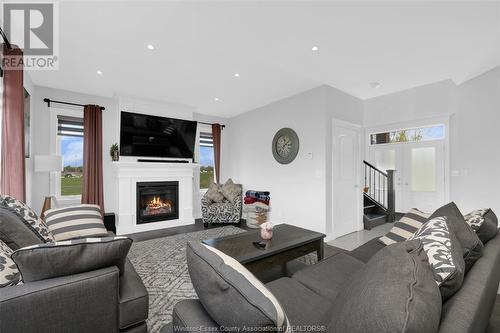 201 Morton, Essex, ON - Indoor Photo Showing Living Room With Fireplace