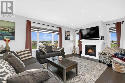 201 Morton, Essex, ON - Indoor Photo Showing Living Room With Fireplace