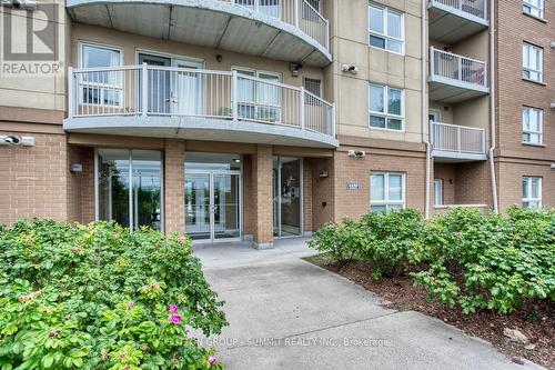 307 - 4450 Fairview Street, Burlington, ON - Outdoor With Balcony With Facade