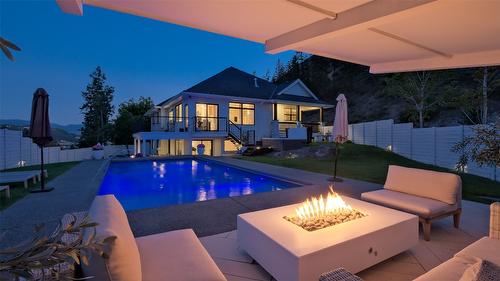 397 Tucker Court, Kelowna, BC - Outdoor With In Ground Pool With Deck Patio Veranda