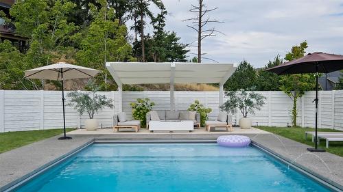 397 Tucker Court, Kelowna, BC - Outdoor With In Ground Pool