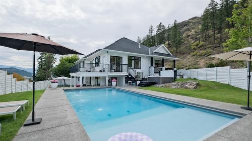 397 Tucker Court, Kelowna, BC - Outdoor With In Ground Pool With Deck Patio Veranda