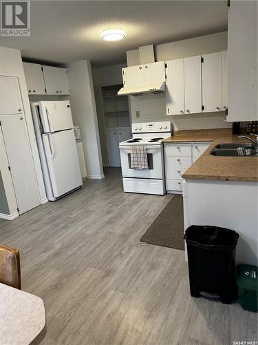 3323 14Th Street, Saskatoon, SK - Indoor Photo Showing Kitchen With Double Sink