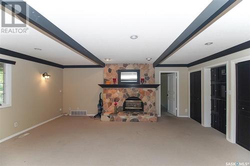 880 Mcniven Avenue, Regina, SK - Indoor Photo Showing Other Room With Fireplace