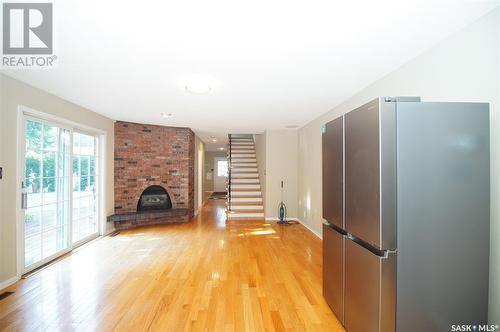 880 Mcniven Avenue, Regina, SK - Indoor Photo Showing Living Room With Fireplace