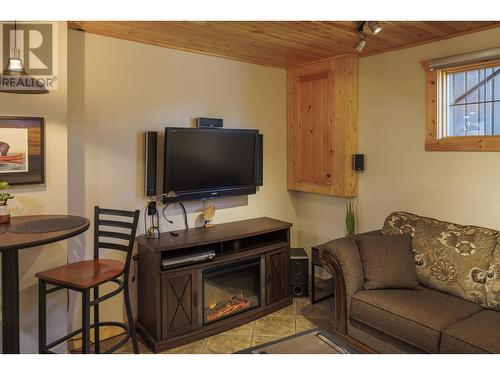 1201 4Th Avenue, Valemount, BC - Indoor Photo Showing Living Room With Fireplace