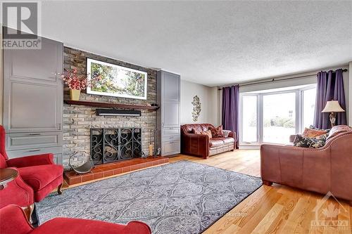 3426 Uplands Drive, Ottawa, ON - Indoor Photo Showing Living Room With Fireplace