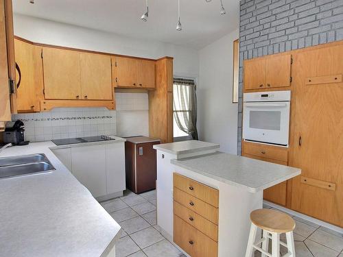 Cuisine - 116 20E Rue, Rouyn-Noranda, QC - Indoor Photo Showing Kitchen With Double Sink